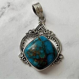 Blue and Silver Necklace with Intricate Turquoise Pendant